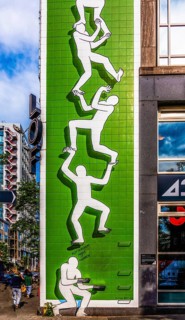 Artwork from the Rotterdam Make It Happen street art campaign in the city center, invites
