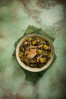 Chakapuli, Georgian dish, stewed meat with herbs and tkemali, in white wine, homemade, no people