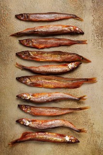 Cold smoked capelin, on the table, top view, no people
