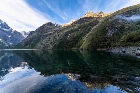 Landscape in New Zealand with mountains and lake. Lake Marian in the evening, Fiordland National
