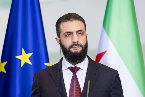 Ahmed al-Sharaa (President of the Syrian Arab Republic) at a joint press conference with Friedrich