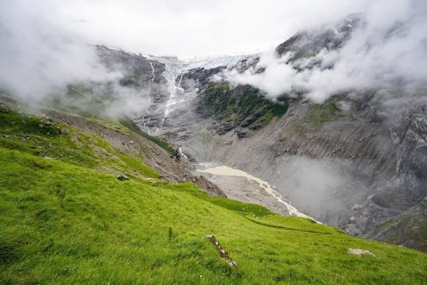 Cloudy mountain landscape with Grindelwald-Fiescherfirn glacier, Bernese Alps, Bernese Oberland,