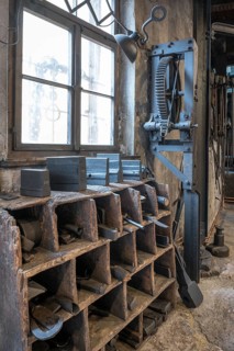 Tool compartments and gear wheel in a historic hammer forge, Industrial Museum Lauf, Sichardstr.,