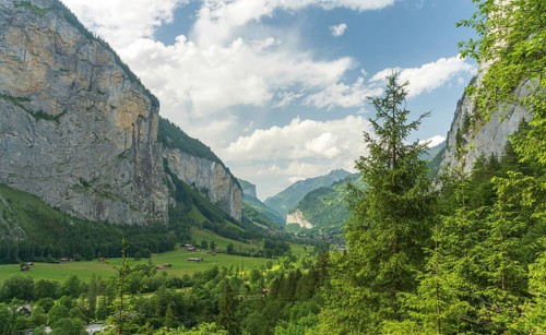 Captivating landscape of Lauterbrunnen Valley, Switzerland, showcasing majestic cliffs, lush