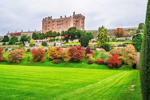 Autumn colors over Powis Castle and Garden, Welshpool, Powys, Wales, UK