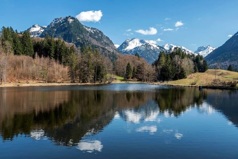 Moor, moor pond, water reflection, mountains of the Allgäu Alps behind, Oberstdorf, Oberallgäu,