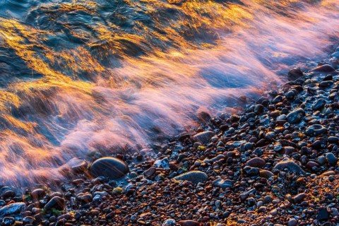 Wave play at sunrise on the chalk coast in Jasmund National Park, Rügen, Sassnitz,