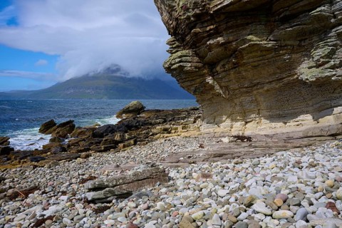 Rocky coast with big rocks and clouds over the sea, Elgol Beach, Elgol, Isle of Skye, Scotland,