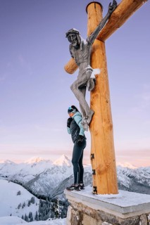 Summit bliss in the snow-covered winter landscape in the Tannheimer Tal in the Alps on the