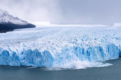 Perito Moreno glacier, breakaway with calving ice on Lake Argentino, blue glacial ice with