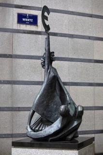 The bronze statue entitled Europe by May Claerhout holds up the euro symbol, Rue Wiertz, European