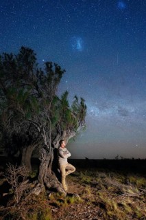 Young man marvels at the stars of the Milky Way, Tres Cerros, Santa Cruz, Argentina