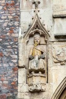 Detail of historic church of Saint John in the Wall, statue of Brennus, Broad Street, Bristol,