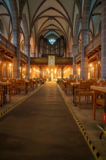 Central passageway in a church with covered tables on both sides, Vesperkirche Calw, Black Forest,