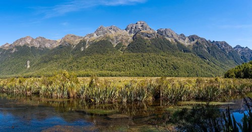 Landscape in New Zealand with mountains and lake. Mirror Lakes and Earl Mountains, Fiordland