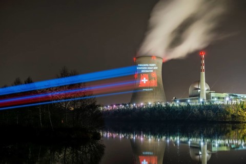 Protest action broadcast by the anti-nuclear organization, projection, night view, 05-03-2026,