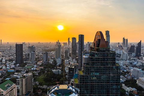 Over the rooftops of Bangkok, sunset, view from the Moon Bar on the roof terrace of the Banyan Tree