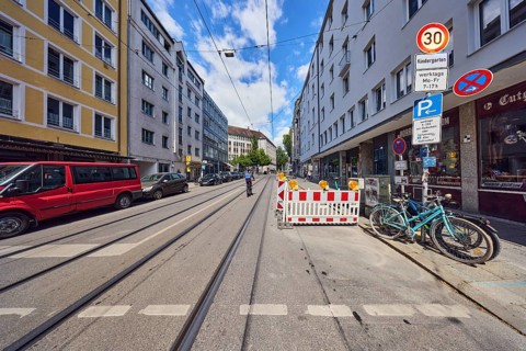 Residential and commercial buildings, general architecture, roadway, sidewalk, parking strips with