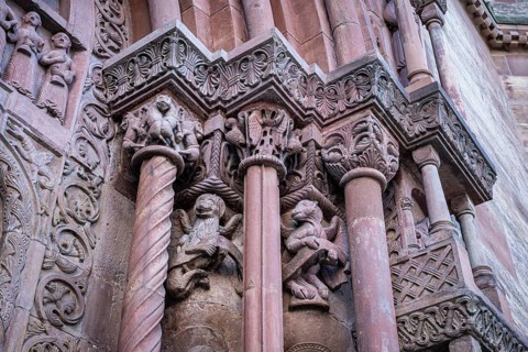Detailed view of the Gallus Gate at Basel Minster made of red sandstone in late Romanesque style,