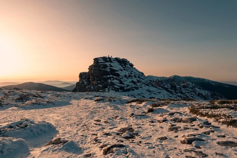 Captivating winter scene of Siete Picos in Madrid's Guadarrama Mountains. The snow-covered