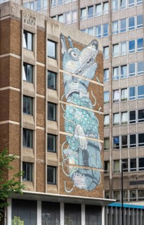 Graffiti mural artwork on building 'Wolf Boy' by Aryz, Nelson Street, Bristol, England, UK Created