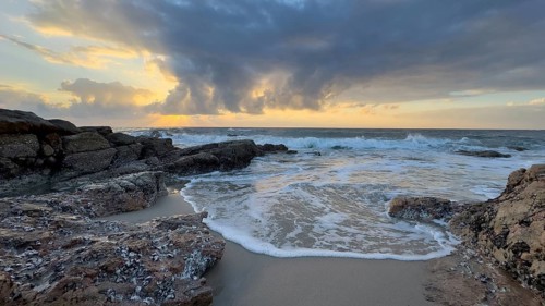 Sunrise on the beach, coast near Sadah, Oman
