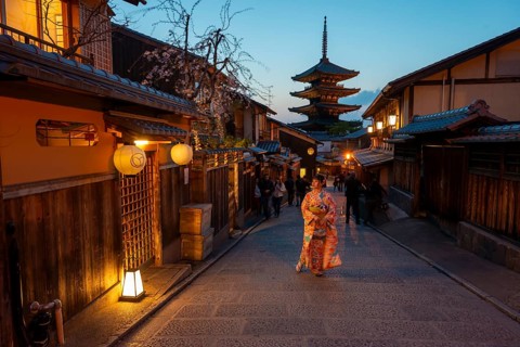 Japanese woman in kimono in an alley, Yasaka dori historic alleyway in the old town with
