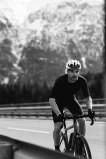 Road bike rider in spring between Lechtal and Tannheimer Tal in front of picturesque scenery of the