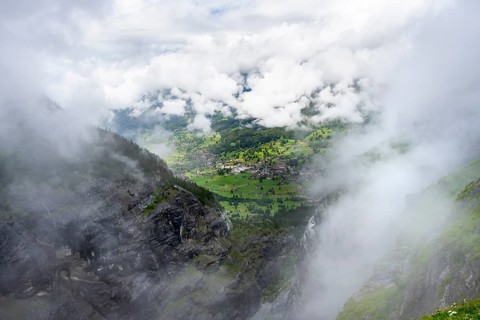 View of the valley to Grindelwald, cloudy mountain landscape, Bernese Alps, Bernese Oberland,
