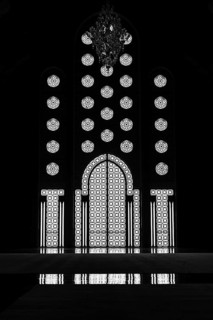 Light incidence in the darkness, interior door and window, arabesque, ornaments in the Hassan II