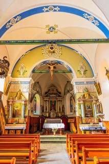 Altar and benches in the Baroque Church Sainte Barbe, Chandolin, Val d'Anniviers, Valais Alps,