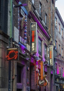 Signs outside Eric's music club, Mathew Street, city centre of Liverpool, Merseyside, England, UK