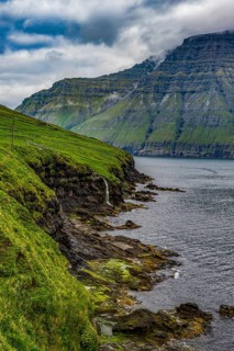Waterfall into the ocean, Bordoy, Faroe islands, Denmark