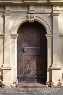 Side portal of the Ruhe-Christi Church with richly decorated wooden door, Rottweil, Rottweil