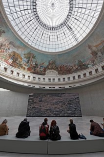 Bourse de Commerce, Pinault Collection, museum visitors in the historic rotunda, concrete cylinder
