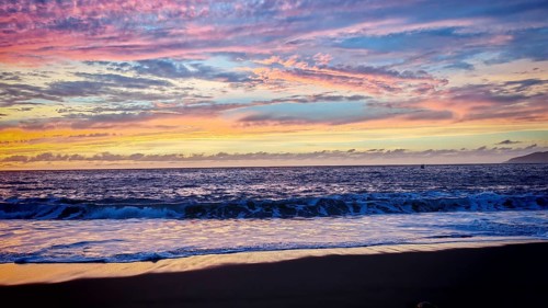 Purple-pink ocean cloudscape at sunset with soft waves, romantic, Tarrafal de Monte Trigo, Santo