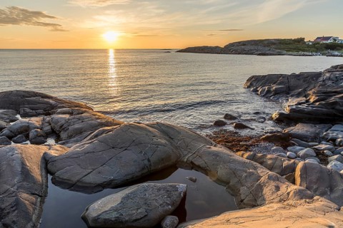 Sunset on the North Sea with archipelago on the west coast near Lerkil, Hallands län, Sweden