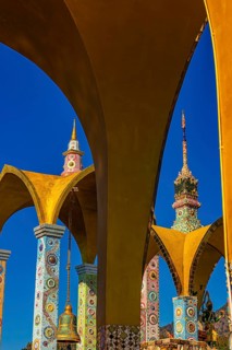 Round arch pavilions decorated with colorful mosaics and glass works of art, Buddhist temple
