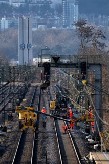 Labourers working with Liebherr A922 Rail Litronic and Kuhnle RR14 EVO 3 Rail two-way working