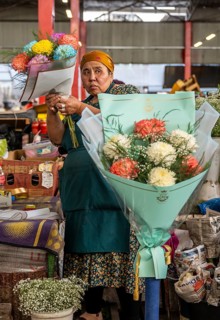 Flower seller at the Osh Bazaar, Bishkek, Kyrgyzstan