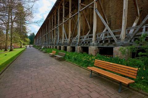 Long path with benches in front of a graduation house in the park, spa town of Bad Orb, Spessart