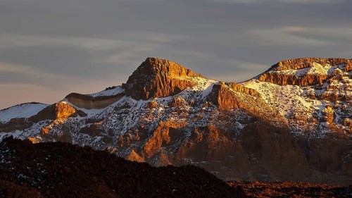 Mirador El Tabonal Negro, caldera, rocks and mountains illuminated by the sun in the golden hour,