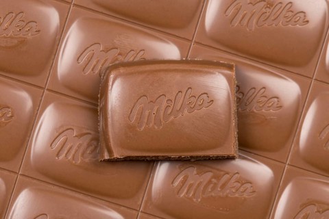 Milka chocolate bar Alpine milk chocolates with logo in Stuttgart, Germany