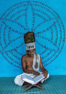 Man from the Ramnami sect reading the Ram Charit Manas, the holy book of the Ramnamis
