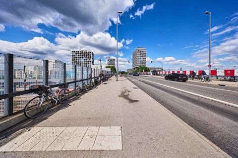 Car bridge and footbridge, metal railings, glass elements, sidewalk, road, lanes, lantern, road