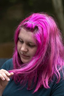 Portrait of a young woman with freckles and violet-colored hair, Ringsheim, Baden-Württemberg,