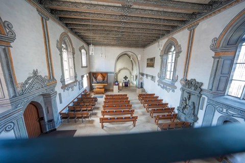 View from above of the interior of a church with benches and organ, Deufringen, Aidlingen,
