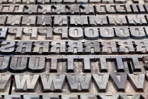Hot metal printing setting, old letters made of lead for letterpress printing, Lettern aus dem