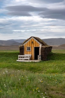 Small traditional wooden peat house with grass on the roof, Möðrudalur, Icelandic Highlands,