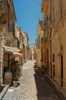 Narrow alley in Noto. The old town centre of Noto is a UNESCO World Heritage Site. Noto, Sicily,